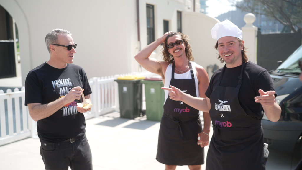 MYOB chef executive Paul Robson with Peking Duk